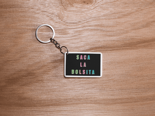 Saca La Bolsita Graphic Keychain - 3 x 2 inches - Gacho Bad Designs