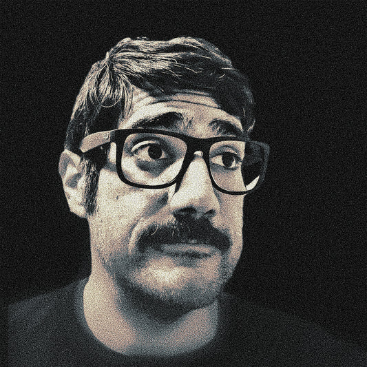 portrait of an extremely handsome man in black and white