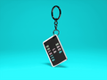 Saca La Bolsita Graphic Keychain - 3 x 2 inches - Gacho Bad Designs