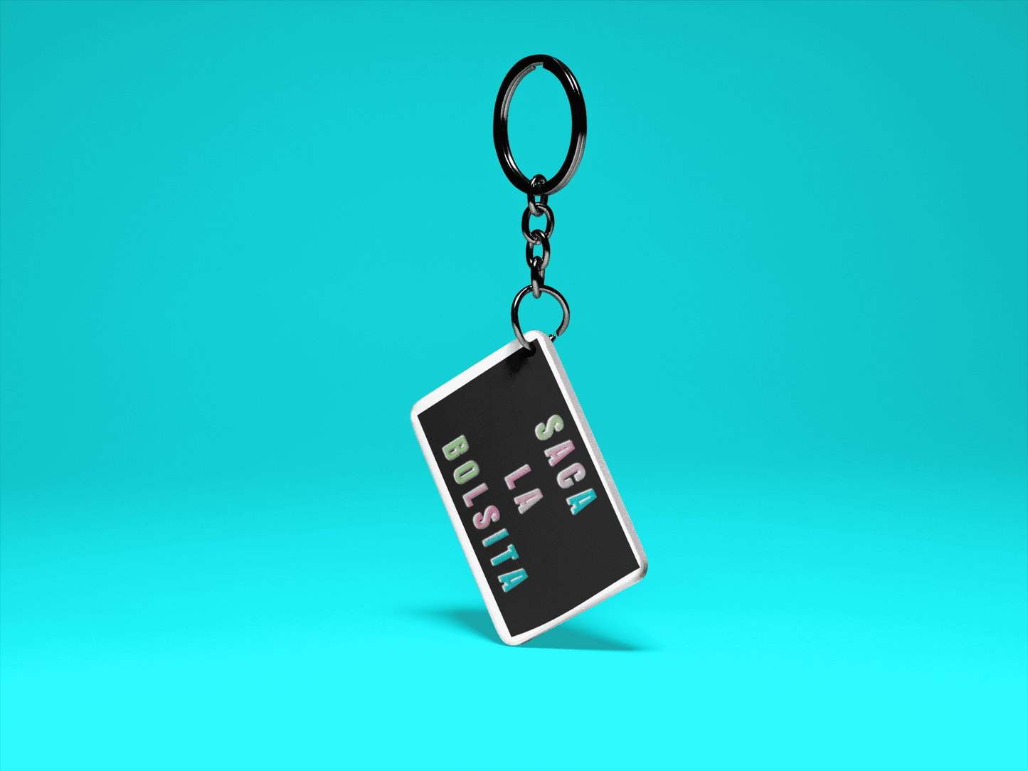 Saca La Bolsita Graphic Keychain - 3 x 2 inches - Gacho Bad Designs